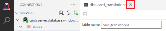 Screenshot showing how to click the X on the table designer tab to close the table designer for the card_translations table.