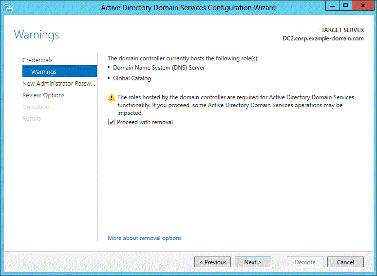Screenshot of the Warnings page of the wizard. The option for removing the domain controller is selected, and its current roles are listed.