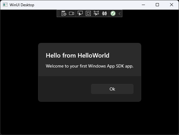 Capture d’écran montrant l’application « Hello World » en cours d’exécution avec une fenêtre contextuelle intitulée « Hello from HelloWorld ».