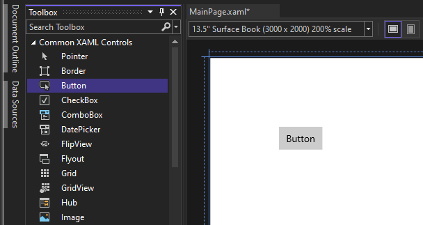 ツールボックス ウィンドウで [ボタン] が強調表示され、デザイン キャンバスの Button コントロールが示されているスクリーンショット。